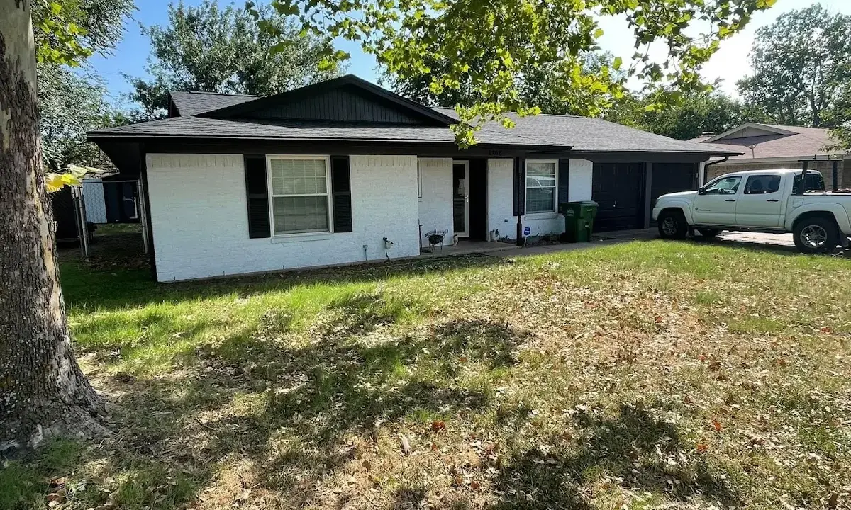 Professional roofing crew working on a residential roof in Chillicothe